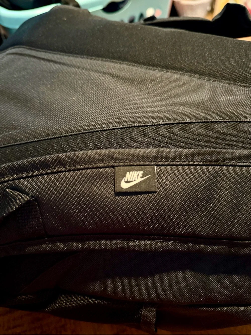 Nike Black Backpack with White Swoosh Graphic and Elastic Bungee